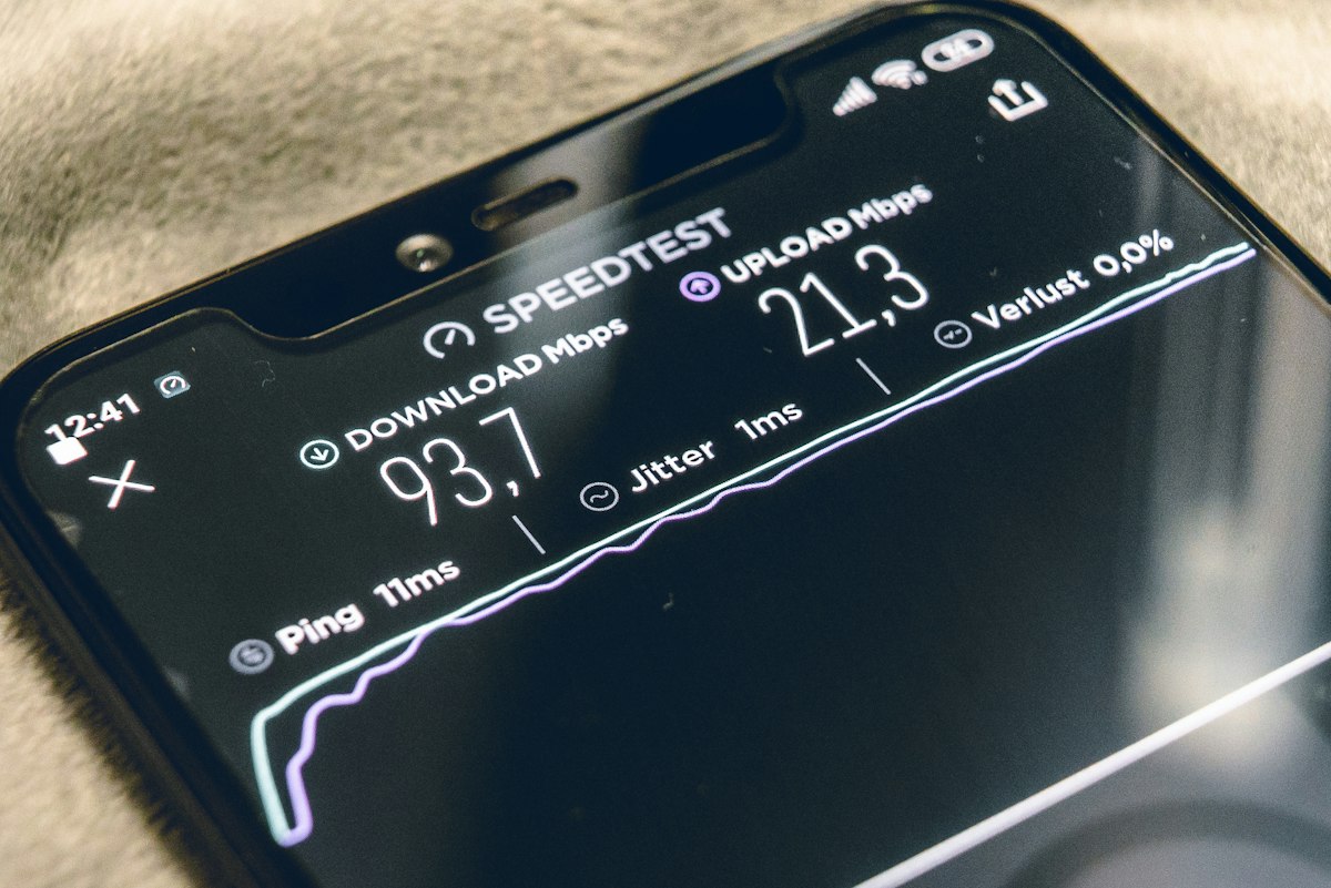 A phone showing a mobile speed test