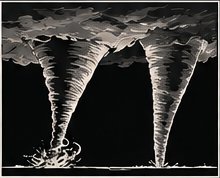 Twin tornadoes: two funnels on the ground at the same time under the same storm