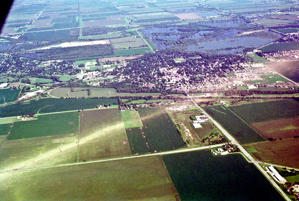 Aerial photograph of the Plainfield damage swath showing intense ground scouring through agricultural fields